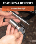 Person holding a stainless steel trailer hitch lock with five-eighth inch pin diameter, includes two keys.