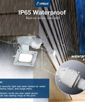 LED Motion Sensor Security Flood Light With 50W 6000LM 6500K IP65 Waterproof 3 Head Exterior Flood Light in the rain on building