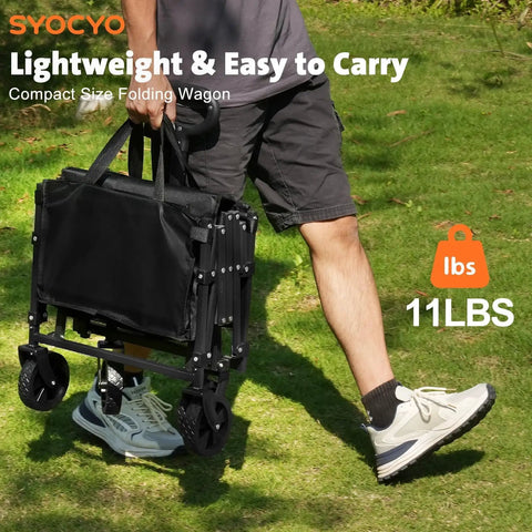 Man carrying a folded collapsible wagon cart 220lbs capacity foldable beach wagon lightweight portable utility cart with wheels
