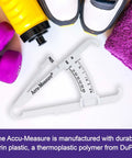 On The Go Body Fat Caliper That Gives Quick, Easy Readouts For Real World Fitness Goals with fitness gear on background