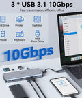 Triple Monitor USB C Docking Station 13-In-1 Hub With Dual HDMI And DisplayPort 100W Power Delivery connected to laptop