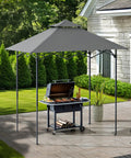 8 By 5 Foot Pop Up Grill Gazebo With Double Tier Standing Height Canopy Magnetic LED Light Adjustable Ceiling Height No Tool Needed Setup In Minutes For Barbecues Picnics And Outdoor Events Gray, installed on a patio with a grill underneath.