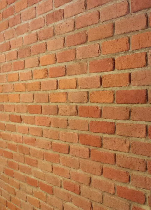 Antique Brick Concrete Mold Kit BS 6113 Flat Molds installed wall section showing realistic old brick texture.