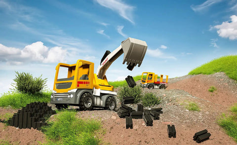 Easy Starter Trucks Kit For Kids 3 Plus Multicolor 30-Piece Building Set To Boost Hands-On Play, Eye-Hand Coordination, Fine And Gross Motor Skills, And STEM Confidence., yellow toy excavator truck with building blocks on dirt