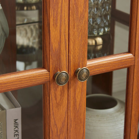 Close-up of dark oak finish and tempered glass doors on 32 Inch LED Accent Curio Cabinet With Seven Color Lights For Collectibles.