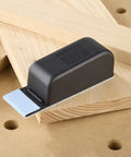 Pocket StickFix Hand Sanding Block With Quick Change Hook And Loop System on wooden surface