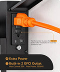 Close-up of Built Tough Black Motion Sensor Outdoor Wall Light With Dusk Till Dawn Auto Sense and Built In Two Electrical Outlets for Plugging Yard Gear.