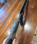 Close-up of Oryx Sportsman Tika T1X SA Right Hand Chassis System Black Rifle Stock on a wooden table.