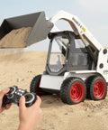 1:14 Scale RC Skid Steer Loader Toy for Kids With 2.4GHz Remote, Realistic Digging Action, lights and sounds on sand