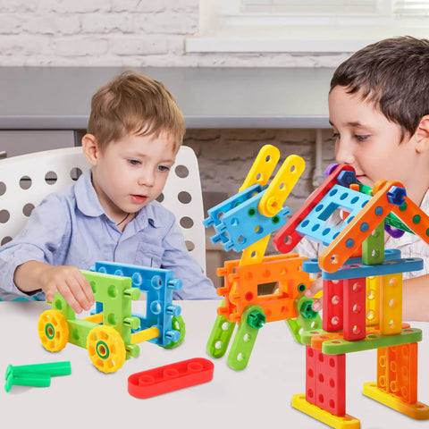 Two kids playing with the Totally Legit 92 Piece Screw Engineering Blocks Set With Sensory Construction Bricks for STEM activities.