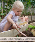 Child using Kid Friendly Garden Starter Kit With Durable Safe Tools For Outdoor Fun Including Gloves, Tote Bag, 22Oz Watering Can