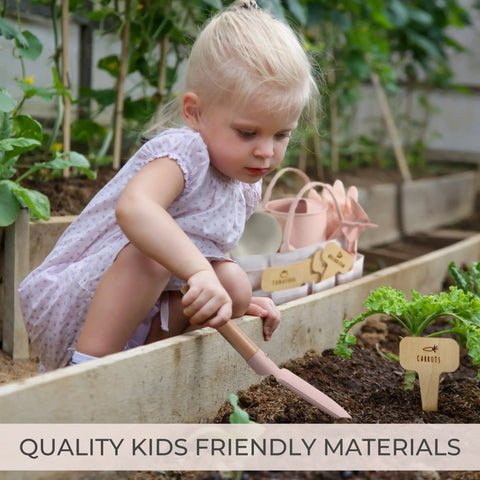 Child using Kid Friendly Garden Starter Kit With Durable Safe Tools For Outdoor Fun Including Gloves, Tote Bag, 22Oz Watering Can