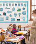 Classroom with Travel The Map Bulletin Board Set For Classroom Decor With World Map Borders Adventure Cutouts displayed on wall.