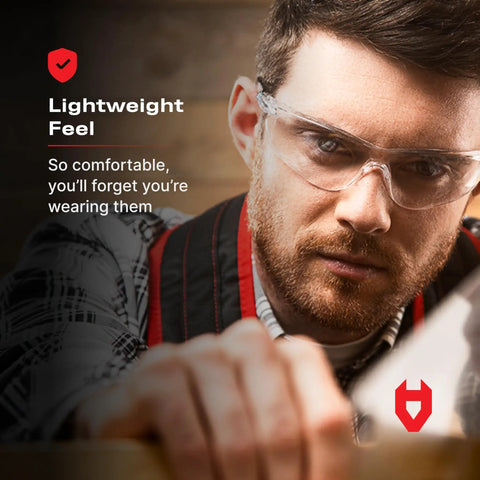 Man wearing Lightweight Protective Safety Glasses With ANSI Z87.1 Rating, Clear Anti Fog Lenses, Scratch Resistant, Built For All Day Comfort Indoors And Outdoors, Heavy Duty 10 Pack, close-up view showing lightweight feel and comfort.