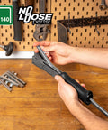 Person handling R311 Hammer Tacker Roofing Membranes Carpeting Heavy-Duty Pro-Grade All Steel Hammer Stapler Uses Flatwire Staples