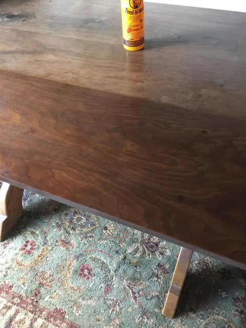 Beeswax Wood Polish And Conditioner For Furniture Feed-N-Wax With Carnauba Wax 16 Ounce Orange on polished wooden table