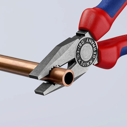 Cobra 3 Piece Pliers Set With Combination Pliers And Diagonal Cutters, Forged Steel Build, holding copper pipe in non-slip grips.