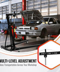 Tough Folding Engine Hoist And Hydraulic Cherry Picker Shop Crane 4400 Pound Lifting Capacity with car in a workshop.