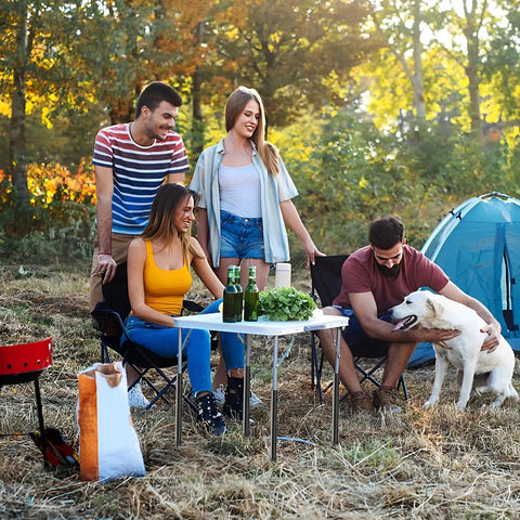 Four Piece Top Tier Folding Table Leg Extenders With Adjustable Heights From Three To Thirteen Inches Crafted From Solid Rust Proof Steel To Elevate Your Setup Kick Lower Back Strain Away And Keep Your Gear Dope For Indoor Or Outdoor Use Daily with friends at a campsite.