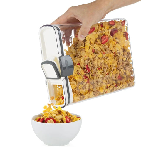 Pouring cereal from Clear Plastic Airtight Food Storage Canister Set for Flour And Sugar With Magnetic Accessories into bowl.
