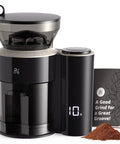 Legit Precision Coffee Grinder with Built in Dosing Scale and Conical Burr System Delivers Straight Up Accurate Results across Eight Grind Steps Perfect for Espresso Pour Over French Press Cold Brew, Matte Black, with digital display and ground coffee.