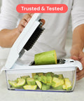 Demonstrating use of Must Have All In One Veggie Chopper With Spiralizer And Bowl Time Saving Food Chopper With Container Fruit Cutter.