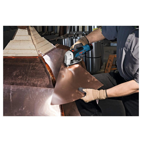 User cutting steel with Heavy Duty Pro Grade 12V Cordless Metal Shear Cuts Steel Four Times Faster With Zero Sweat For Flawless Straight And Curved Cuts Up To One Point Three Millimeter Thick No Battery Or Charger.