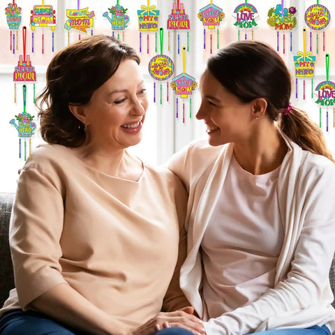 Mother and daughter smiling with DIY Wind Chime Craft Kit Make Your Own Chimes For Moms Day Gift displayed in the background