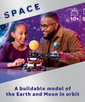 Father and daughter assembling Planet Earth And Moon In Orbit Building Set For Kids 10 Plus An Outer Space STEM Toy