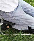 Person using Set Of 2 Knee Seats For Gardening, Strap On Kneeling Pads For One Leg Support on grass
