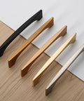 Various cabinet handles displayed, including a 10 Pack 5 Inch Brushed Satin Nickel Cabinet Handles For Kitchen Cabinets Cupboards And Drawers with smooth finish.