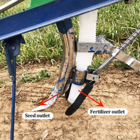 Hand Push Garden Seeder Walk Behind Row Planter Manual Seeder Machine showing seed and fertilizer outlets on soil