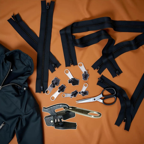 Six Piece Black Universal Zipper Repair Kit With Replacement Teeth And Sliders For Jackets And Bags Easy Install No Brainer Quick Fix Durable Zipper Fasteners Fits Standard Size Zippers For Jackets Bags Backpacks And More displayed with tools and jacket