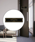 Clear Acrylic Wall Name Plate Holder for Doors and Desks 2x8 Sign Frame With Adhesive Tape in an office setting, close-up view.