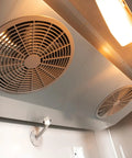 Interior view of Heavy Duty Three Door Commercial Reach In Freezer With Stainless Steel And Aluminum Interior showing cooling fans.
