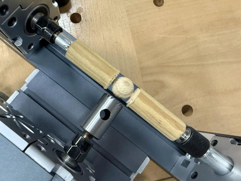 EssEthmy 60W Mini Metal Wood Lathe, Precision Bead Turner With 12k RPM shows wood piece in holder for crafting.