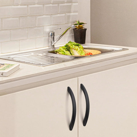 10 Pack 5 Inch Matte Black Curved Cabinet Pulls For Kitchen Cupboards and Dresser Drawers with Arch Style Hardware installed on white cabinet.
