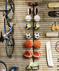 Wall Mounted Basketball Rack And Football Holder For Garage Sidekick, Adjustable Diy Soccer Stand With Basket, Hella Durable Black Metal Game Ball Organizer Flipping Tight Clutter Into Smooth Storage Flow with sports balls and bicycle.