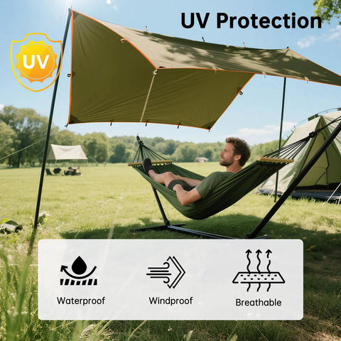 Man relaxing under Waterproof 10x10.5 Ft Tarp Shelter For Camping And Backpacking Ripstop 210T Canopy With UV Protection