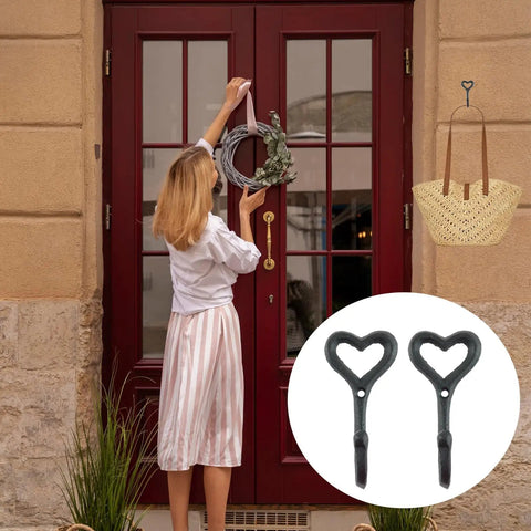 Dope Black Cast Iron Heart Shaped Wall Hooks For Home Decor Vibes And Closet Organization Heavy Duty Decorative Craft Hanging Hardware Reliable Set Of Two Pieces used for wreath on a front door.