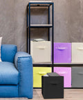 Super Durable Collapsible Storage Cubes 10.5 Inch Foldable Fabric Bins in a stylish living room setting with a blue couch.