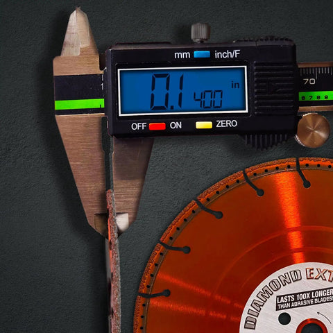 Close-up of Heavy Duty Diamond Cut Off Wheel 12 Inch For Metal Cutting All Purpose Diamond Blade with digital caliper measuring thickness.
