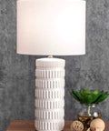 Franklin 25 Inch Ceramic Table Lamp With Linen Shade For End Tables And Living Rooms with textured base, modern decor.