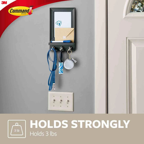 Slate Dry Erase Message Center With Key Hooks, One Message Hub With Eight Medium Strips, Damage Free Wall Mount in use.