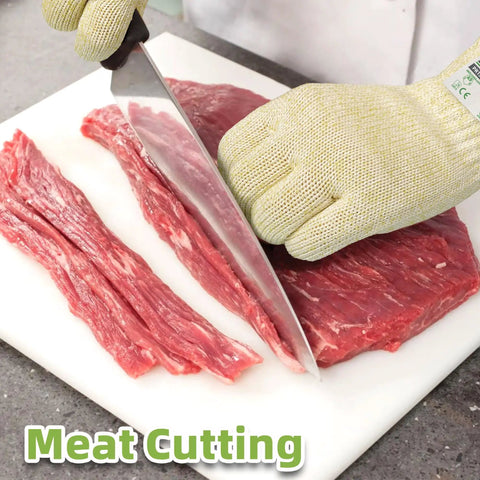 Ultra Durable ANSI Cut Resistant Gloves With 10X Reinforced Food Grade Safety for meat cutting, size M on a kitchen counter.