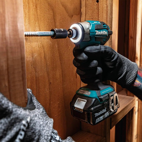 Using 18V LXT Brushless Cordless Drill And Impact Driver Combo Kit on wood, showing 5.0Ah battery, lightweight design, and power.