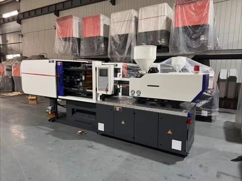 Top Shelf Hydraulic Injection Molding Machine For Plastic Chair Production And Household Goods Custom Industrial Workhorse Crank Out Multi Material Parts Daily in industrial setting with control panel and materials.