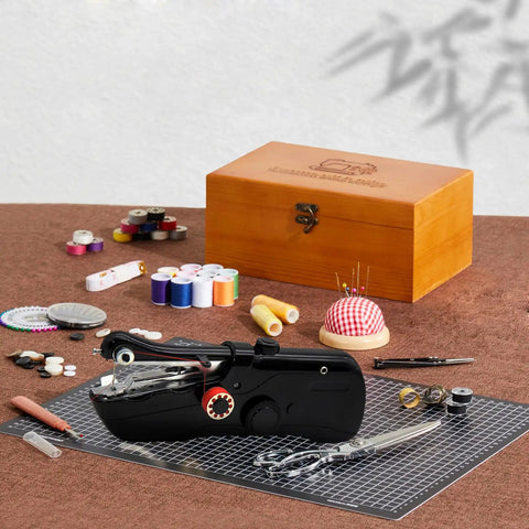 Grab-and-Go Handheld Sewing Machine Kit With 142 Piece Essentials, Wooden Storage Box, Dual Power Supply, Electric Switch, Heavy-Duty Scissors, Assorted Needles And Threads For Quick Home Repairs, with black handheld machine and wooden box