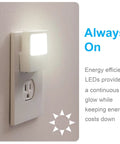 Always On LED Night Light Plug In Wall For Bedroom Nursery Bathroom Hallway Compact Low Key Soft Glow Energy Efficient UL Listed 2 Pack Model 11311 shown plugged into wall outlet, emitting soft glow.