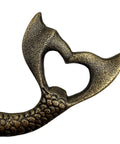 Close-up view of Heavy Duty Cast Iron Mermaid Bottle Opener For Beach House Kitchen Decor, showcasing heart-shaped cap lifter design.